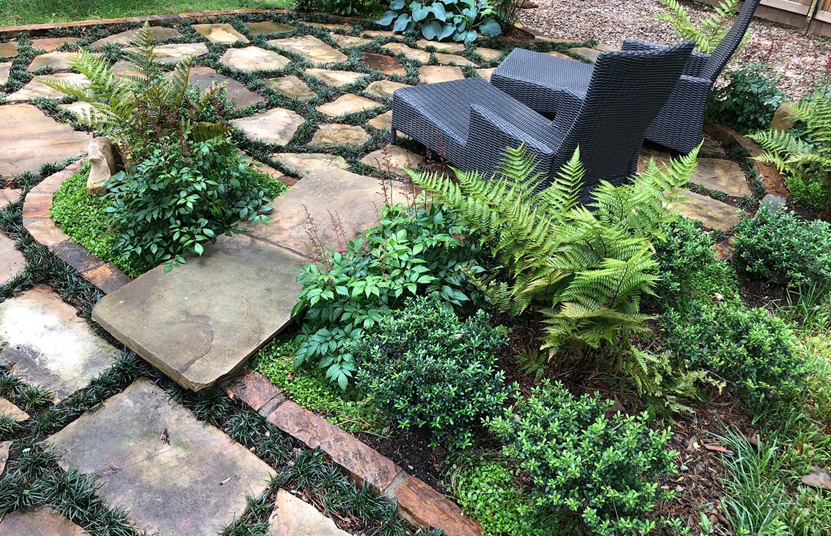 Beautiful stone patio in Decatur with integrated drainage system, creating a dry and inviting outdoor living space.
